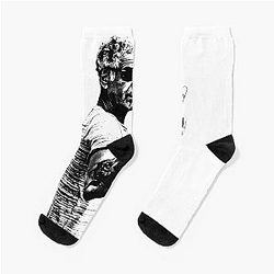 Memories of Anthony Bourdain in a middle finger pose wearing socks