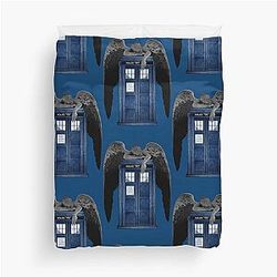 Angel Weeping on Blue Box Duvet Cover