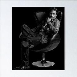 Chayanne Sitting on a Chair Poster