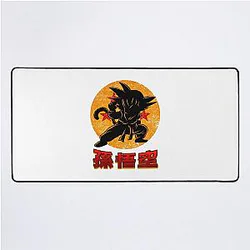 Epic Son Goku Dragon Ball Artwork Featuring Iconic Anime Character Desk Mat