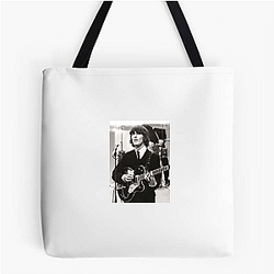 George Harrison was the lead guitarist of The Beatles George Harrison Bags