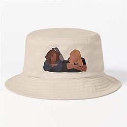 Ginny and Georgia on a Bed Fighting for a Bucket Hat