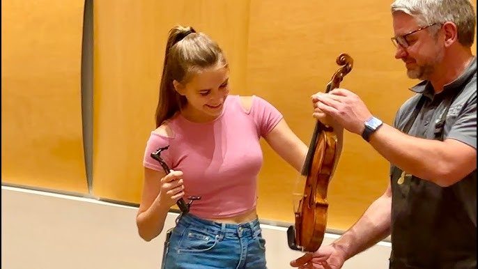 Showcase Your Style with Karolina Protsenko Merch for Violin Fans!