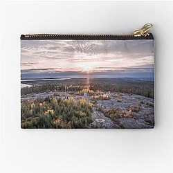 A sunset over James Bay in Canada pouch