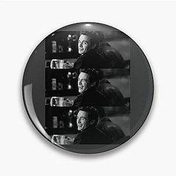 James Franco winks at the camera with a Pin