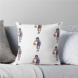 Jared Mccain with a balloon throw pillow