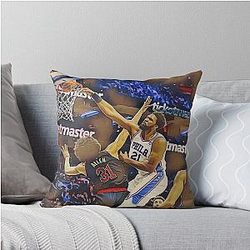 Joel Embiid posterizing Jarrett Allen Throw Pillow