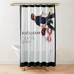 Keith Urban Defies Gravity Shower Curtain 

(I removed the duplicate word "Defying" -> "Defies")
