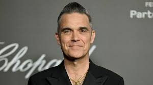 Robbie Williams Most Iconic Live Performances A Showman Like No Other