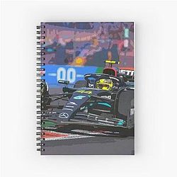 Lewis Hamilton racing his 2023 F1 car during the 2023 Mexico Grand Prix from the front Spiral Notebook