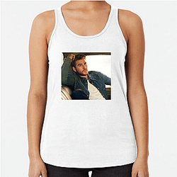 Liam Hemsworth is the brother of Chris and Luke Hemsworth Liam Hemsworth Tank Tops