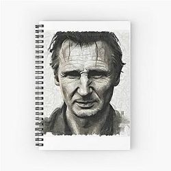 Sketch of Liam Neeson in a spiral notebook.