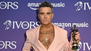 Unleash Your Inner Fan: Best Robbie Williams Merch Picks!