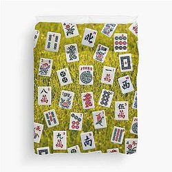Mahjong tiles on green grass background Duvet Cover