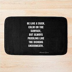 Be like a duck.  Calm on the surface, but always paddling like the dickens underneath. - Michael Caine Quote - QPOSB Poster Graphix Bath Mat