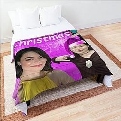 Miranda Cosgrove wishes Merry Christmas comforter