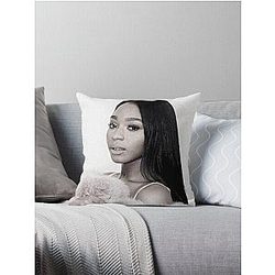 Normani Kordei throw pillow