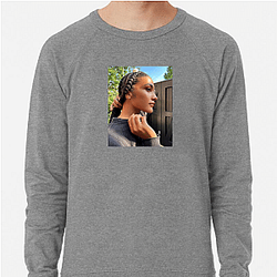 Olivia Dean is known for her soulful and jazzy style Olivia Dean Sweatshirts