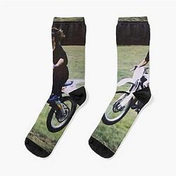 Ozzy Osbourne on a dirt bike