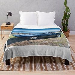 DeTomaso Pantera at the coast Throw Blanket RB1110