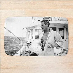 Young Paul Newman on a boat mat