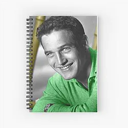 Paul Newman with green notebook