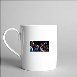 Strum the Change Playing For Change Mugs