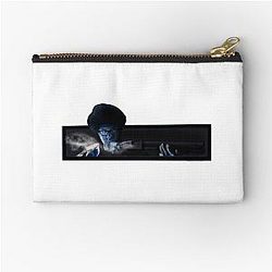 Richard Ayoade is Morris Moss as Moss-Berg Zipper Pouch