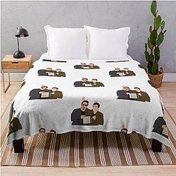 Robert Downey Jr. and Tom Holland Throw a Blanket