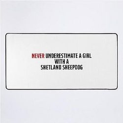 Funny Shetland Sheepdog girl Desk Mat is not a clear title. It seems "girl" might be an extra word here. 

Funny Shetland Sheepdog Desk Mat