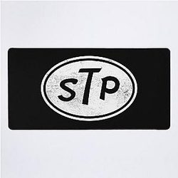 stp oil 4 Desk Mat