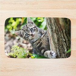 Super cute kitty cat in the garden says hey to you! Bath Mat