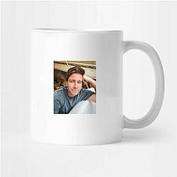 Versatile Performer Torrance Coombs Mugs