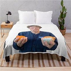 Willem Dafoe Holding a Moldy Orange Throw Blanket