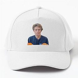 Willem Dafoe Holding a Moldy Orange in a Baseball Cap