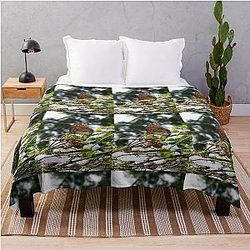 Monarch butterfly before flying in search of sun by Yannis Lobaina Throw Blanket