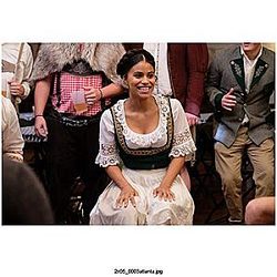 Atlanta TV Series 8Inch x 10Inch on set photo of Zazie Beetz sitting in a dress smiling