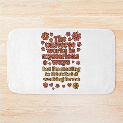 The universe works in mysterious ways - inspired retro quote Bath Mat