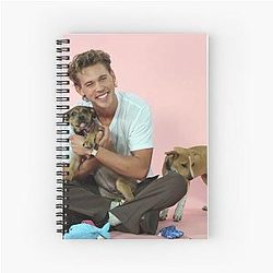 Austin Butler playing with his dog