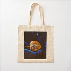 Golden Seed Pod on Blue Velvet Cotton Tote Bag