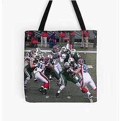 Brett Favre trying to get a pass off All Over Print Tote Bag