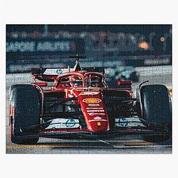 Charles Leclerc racing 2024 F1 car at the Singapore Grand Prix