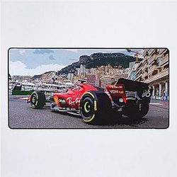 Charles Leclerc racing his 2023 race car from the rear desk mat
