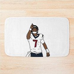C.J. Stroud points to God bath mat