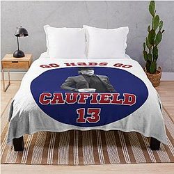 Cole Caufield of the Montreal hockey team Throw Blanket
