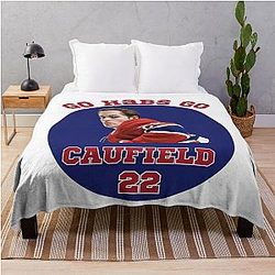 Habs player Cole Caufield 22 of the Montreal hockey team throw blanket