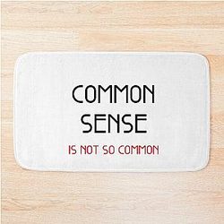 Common sense is not common Bath Mat
