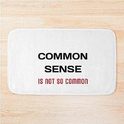 Common sense is rare these days Bath Mat