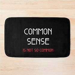 Common sense is not so  Bath Mat