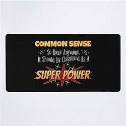 Common Sense is a Superpower Desk Mat